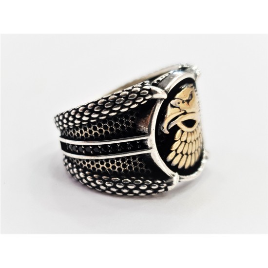 Mens silver ring with eagle head and claw design
