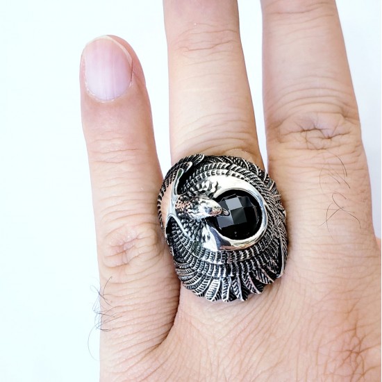 Men's silver eagle ring highlights the sun